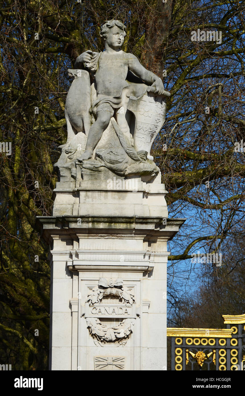 Canada Gate (Maroto Gate) forms part of the Queen Victoria Memorial scheme in London, UK. Green Park beyond, Stone sculpture detail Stock Photo