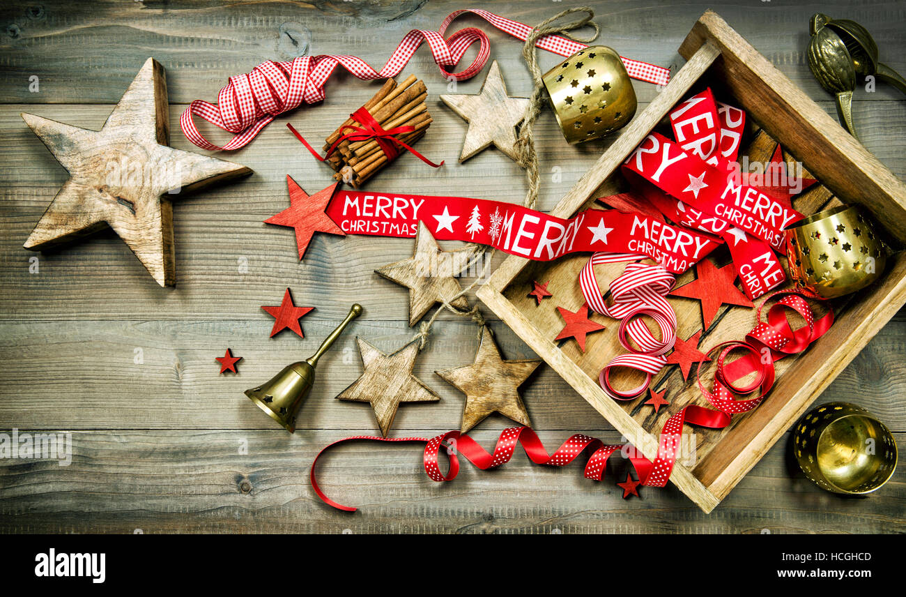 Red and golden christmas decoration. Retro style dark toned picture Stock Photo