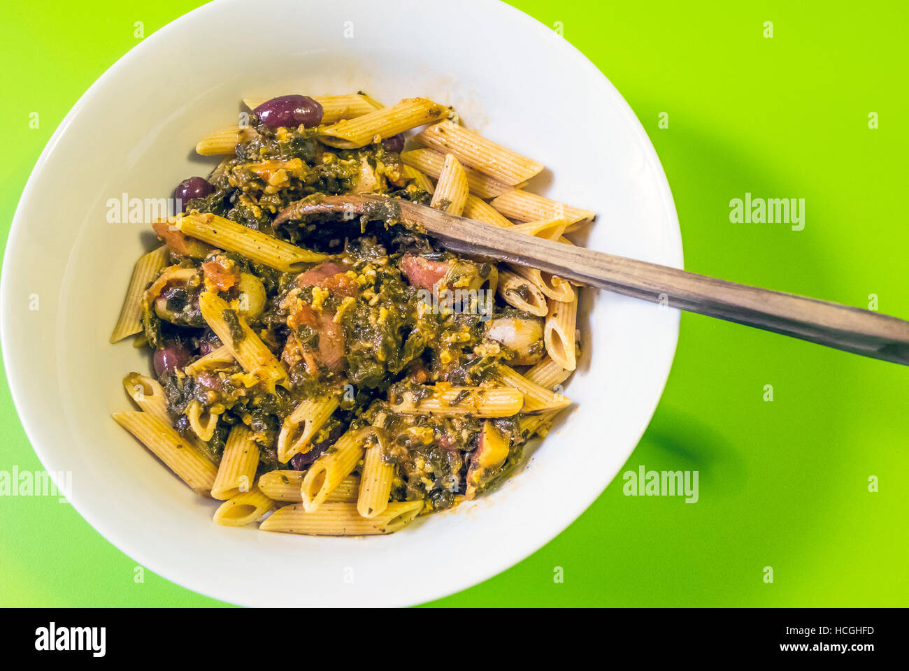 Penne pasta with spinach Stock Photo - Alamy