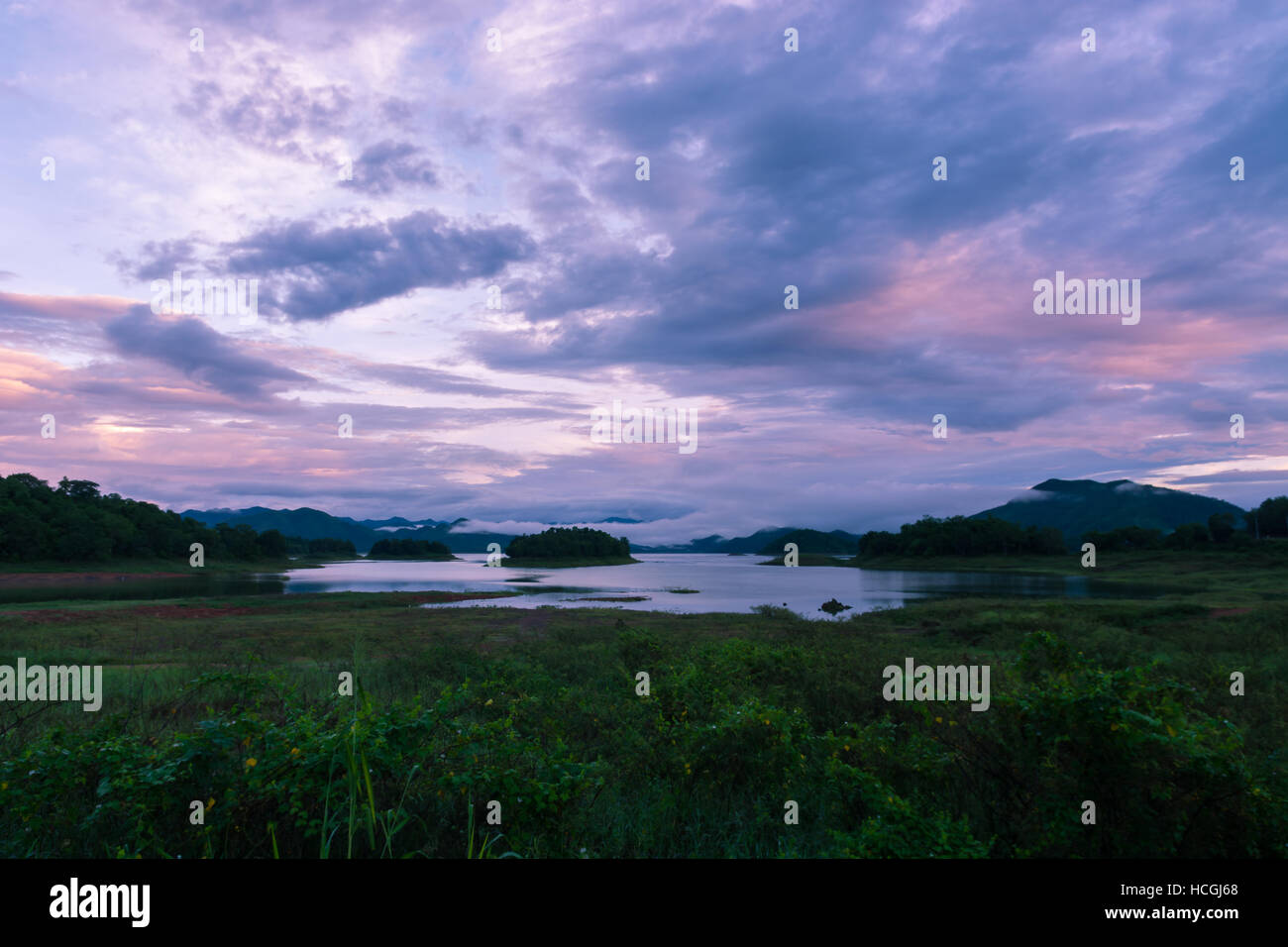 Dark clouds and rain storm over the lake Stock Photo - Alamy