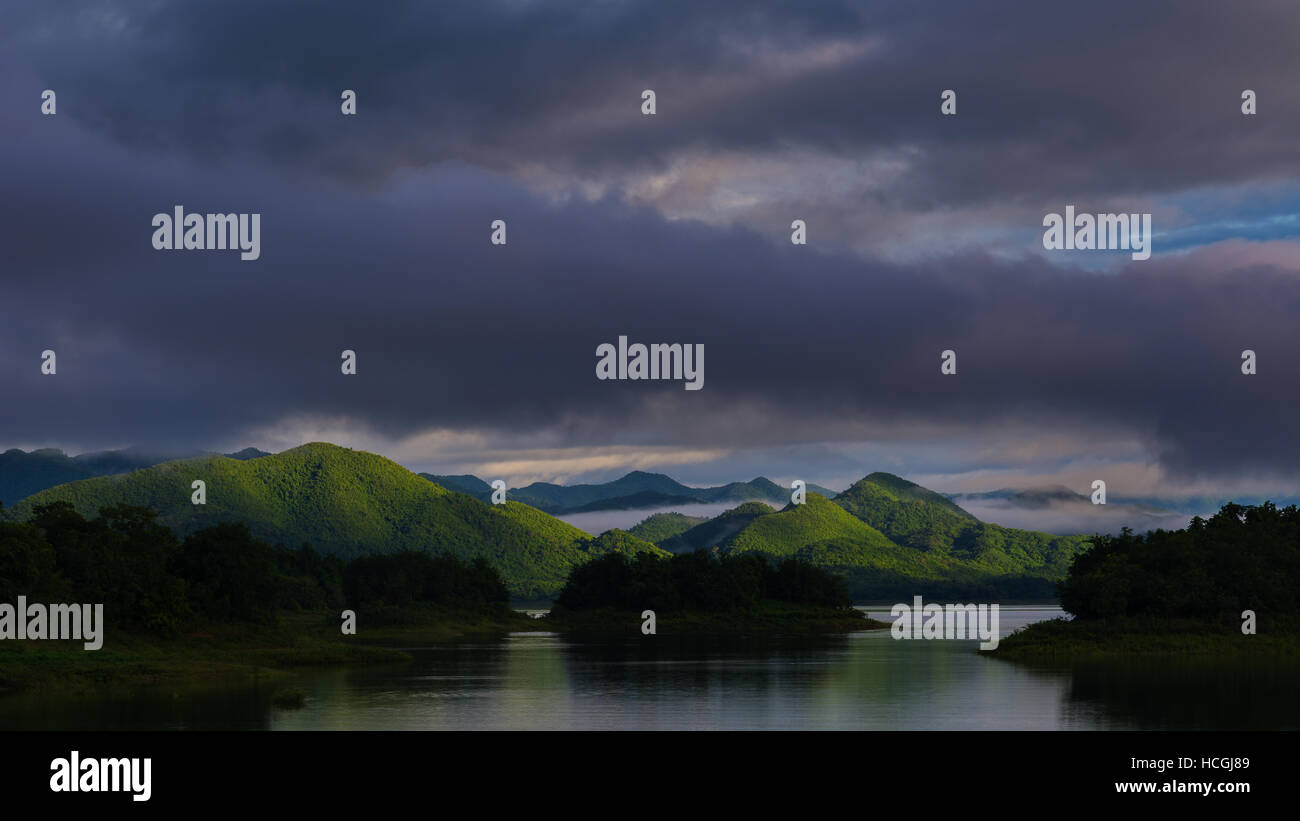 Dark clouds and rain storm over the lake Stock Photo - Alamy