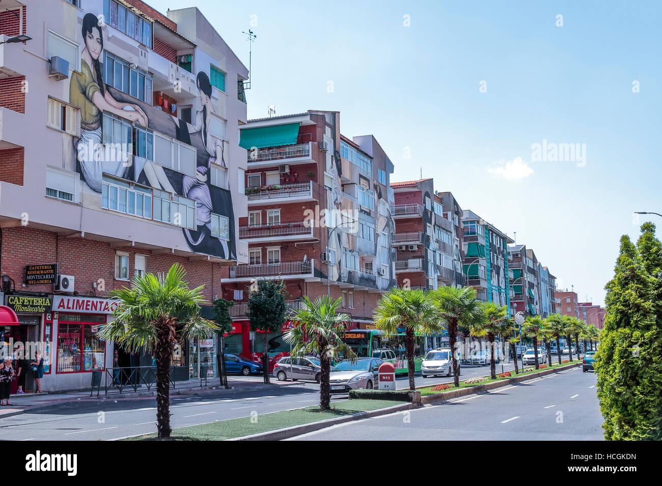 TORREJON DE ARDOZ, MADRID, SPAIN - JULY 15: street in the downtown of the  city of torrejon de ardoz, spain with facades decorated with pictures of  dif Stock Photo - Alamy