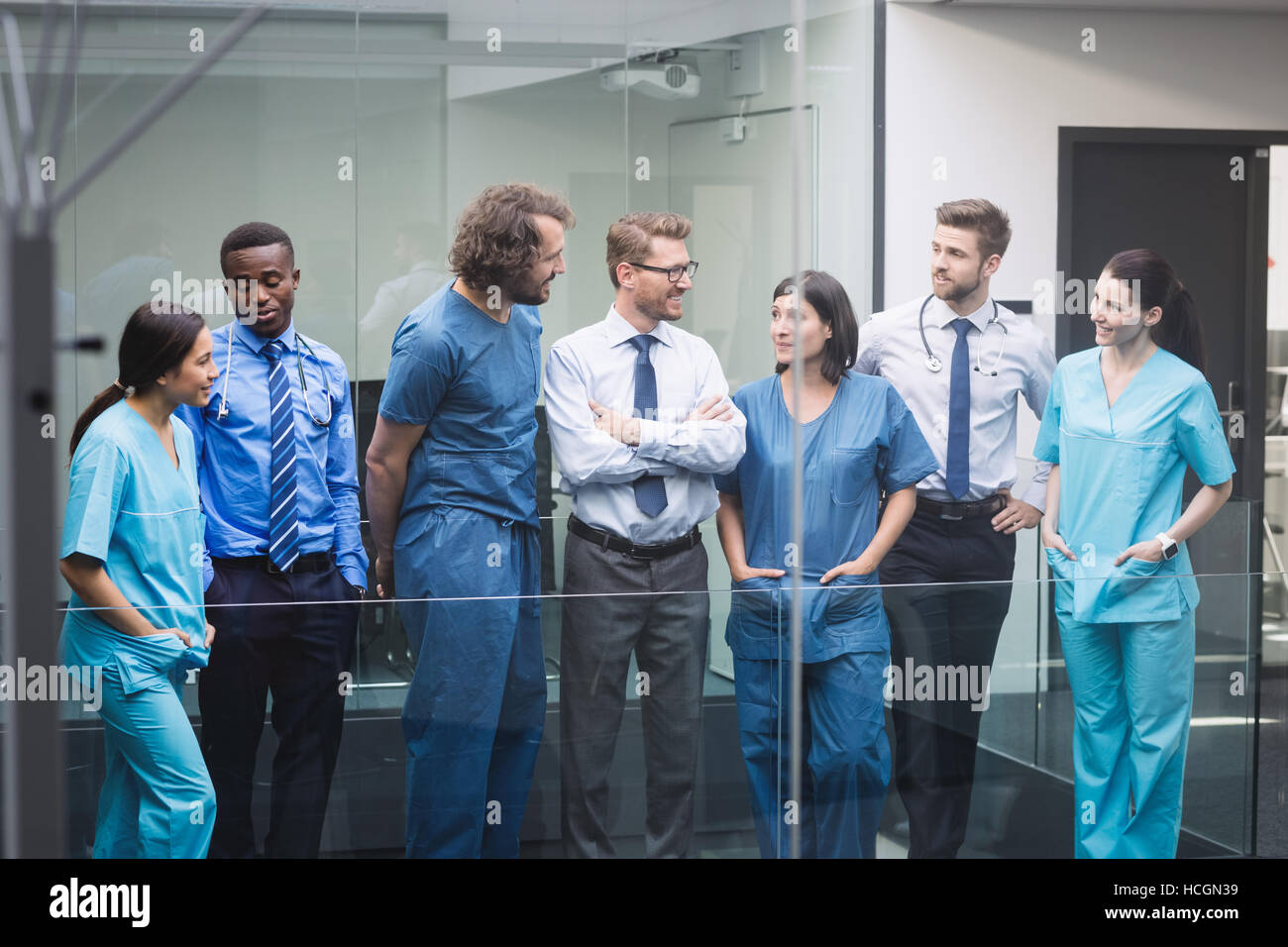 Team of doctors discussing with each other Stock Photo