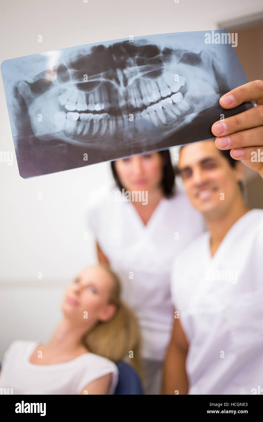 Dentists discussing over dental x-ray report Stock Photo