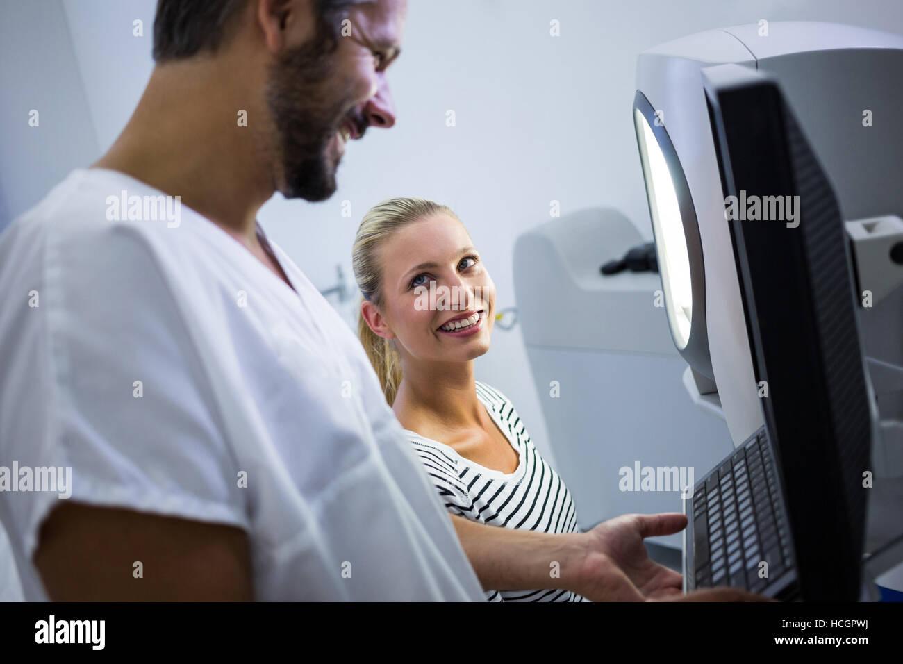 Woman discussing with dermatologist Stock Photo