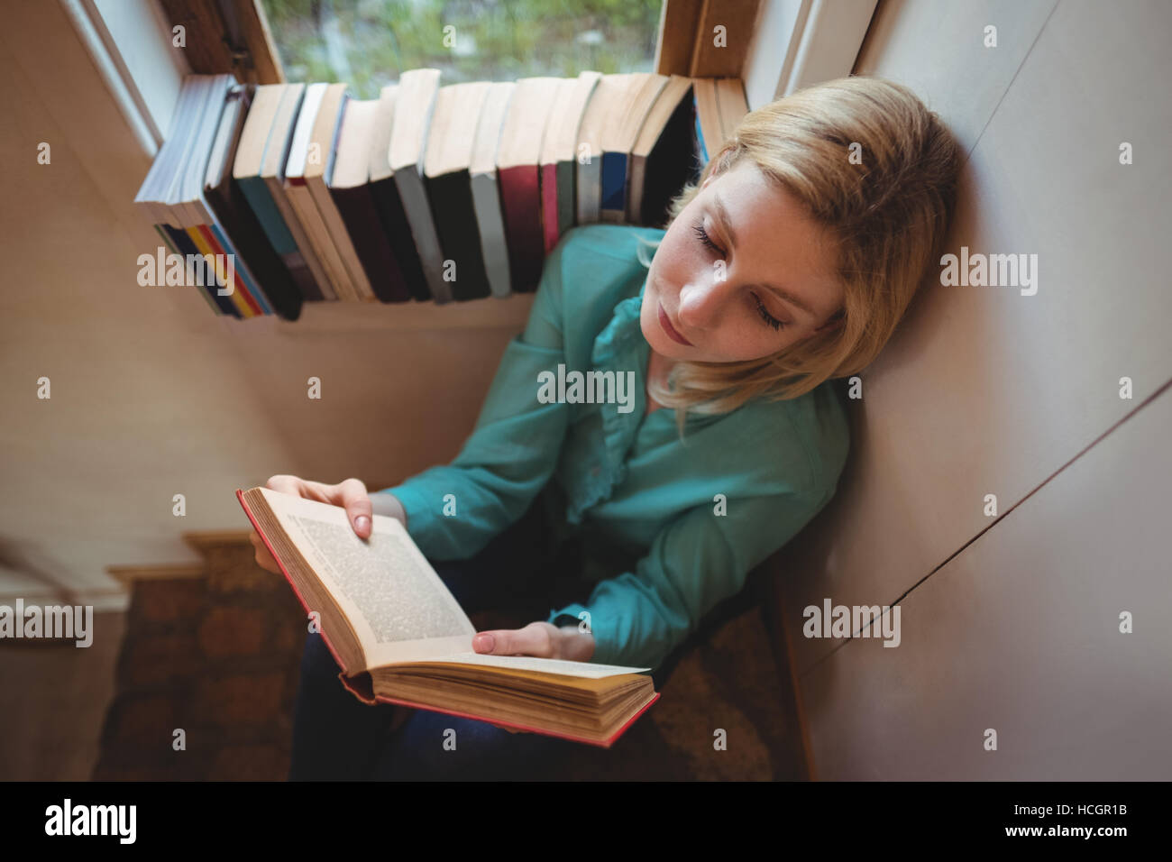 Beautiful woman reading book Stock Photo