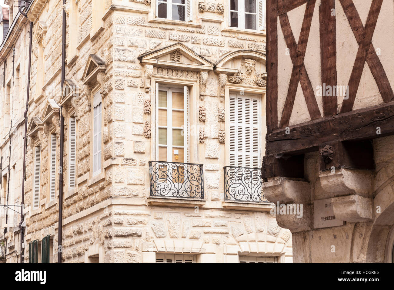 Hotel Benigne Malyon and an old half timbered house in old Dijon. Stock Photo