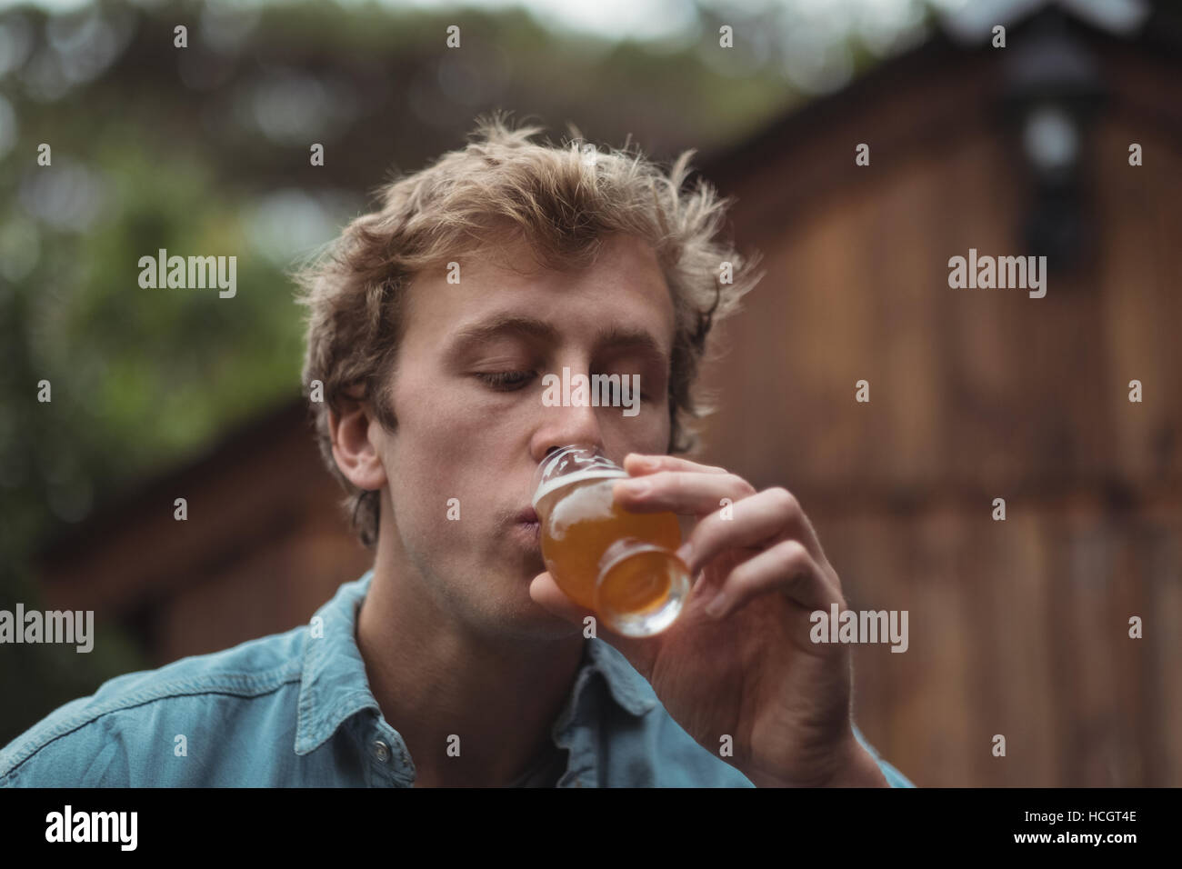 Man drinking beer from beer glass Stock Photo