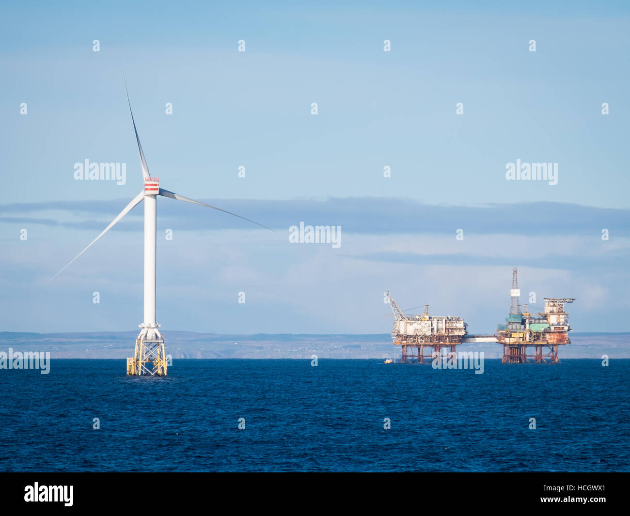 Wind Turbine Generators of the Beatrice Demonstration Project and Beatrice A oil platform in the Moray Firth, Scotland Stock Photo