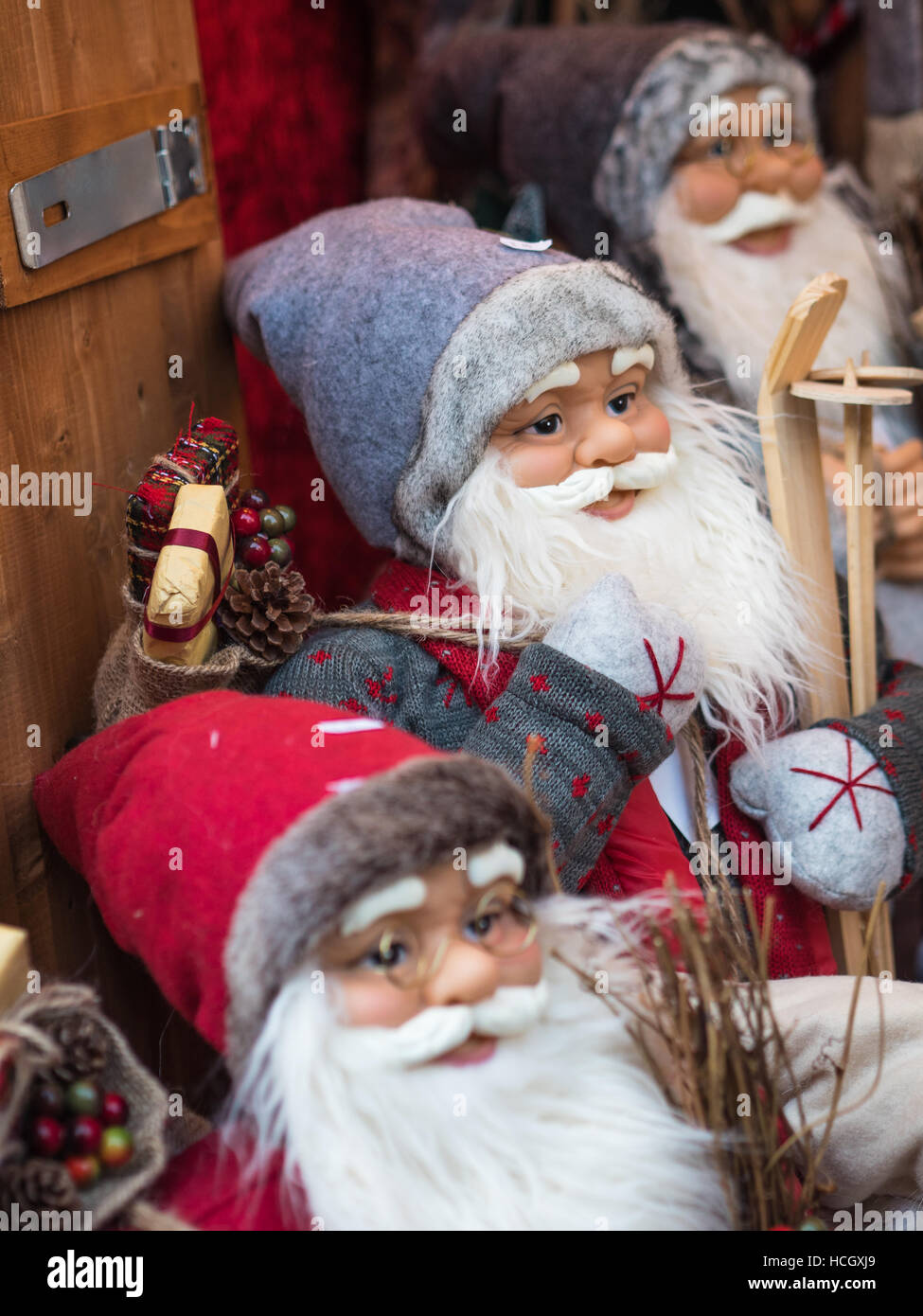Line of Father Christmas dolls at a Christmas Market Stock Photo
