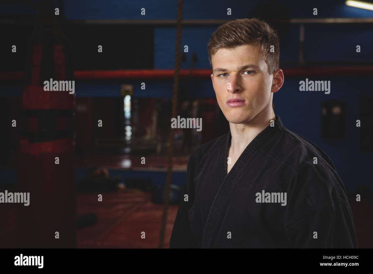 Karate player standing in fitness studio Stock Photo