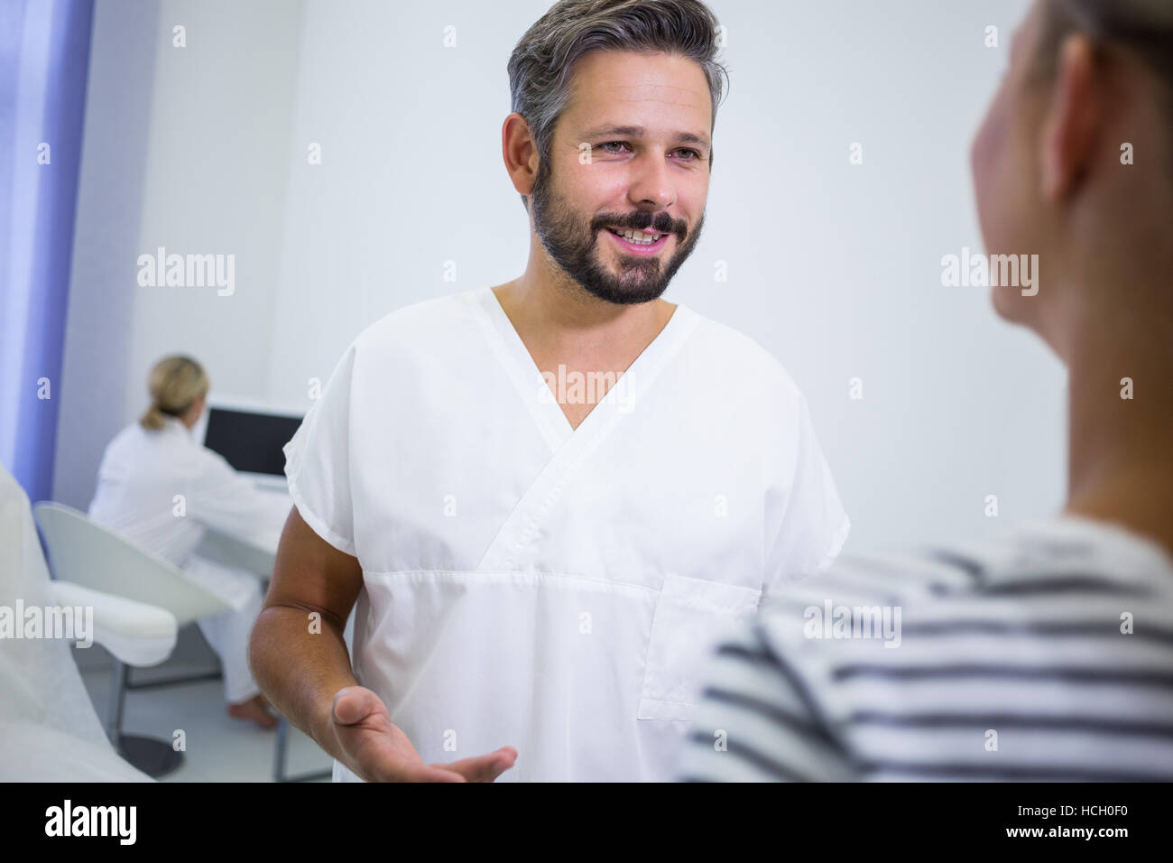 Doctor discussing with a patient Stock Photo