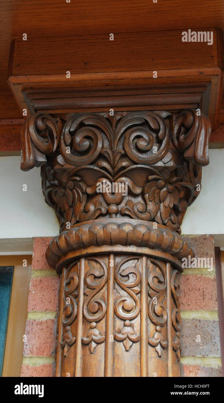 A carved teak column an capital, from the Swaminarayan Hindu temple in