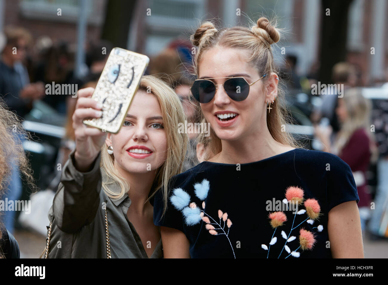 Chiara Ferragni selfie with a fan after Fendi fashion show, Milan Fashion Week street style on September 22, 2016 in Milan. Stock Photo