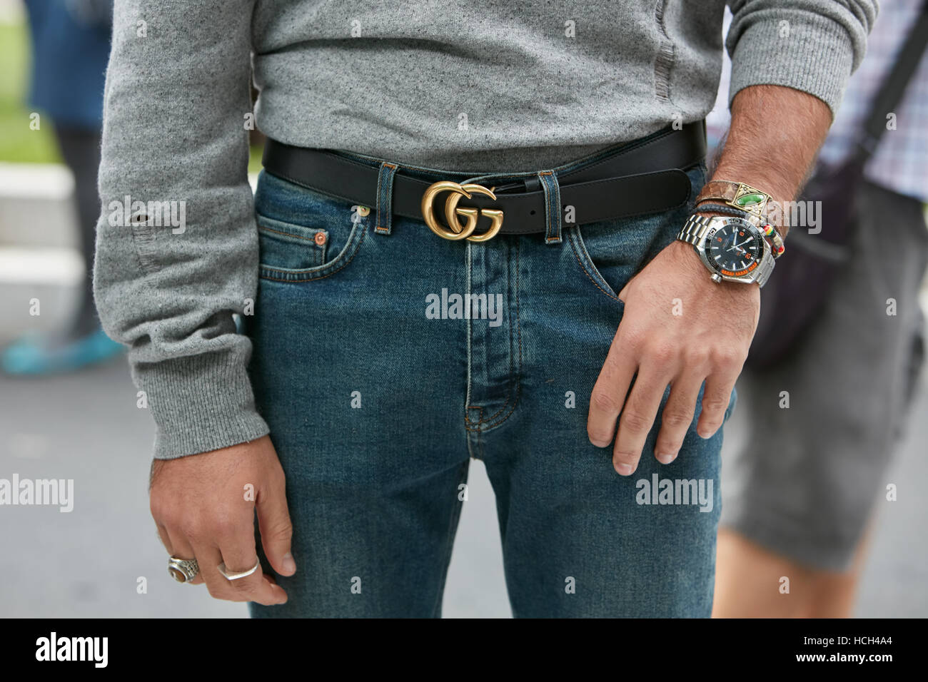 Man with Omega watch and Gucci belt before Giorgio Armani fashion show, Milan Fashion Week street style on September 23, 2016. Stock Photo