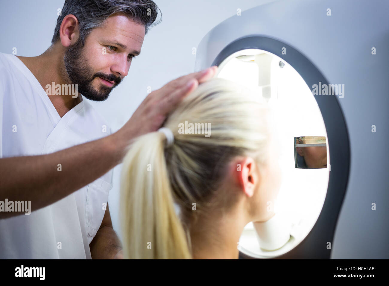 Woman receiving aesthetic laser scan Stock Photo
