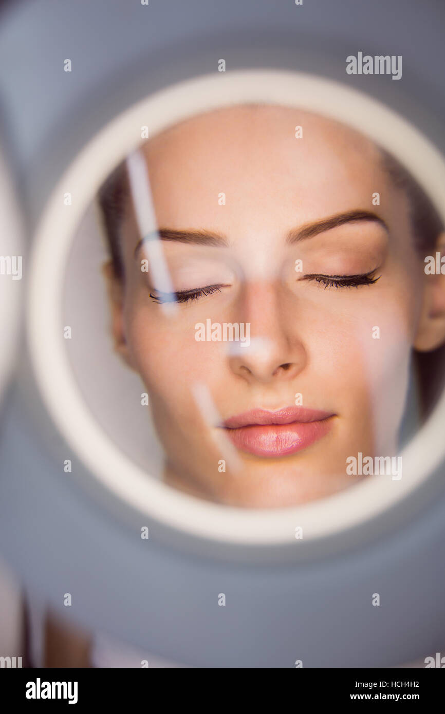 Dermatologist performing laser hair removal on patient Stock Photo Alamy