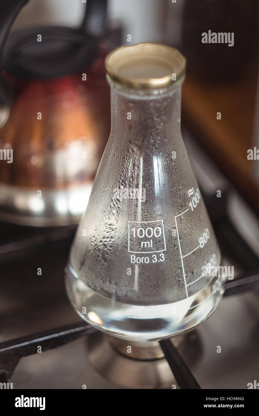 Conical beaker on stove Stock Photo Alamy