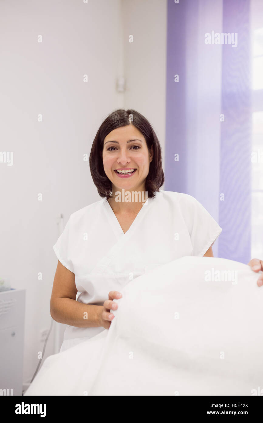 Dermatologist standing in clinic Stock Photo Alamy