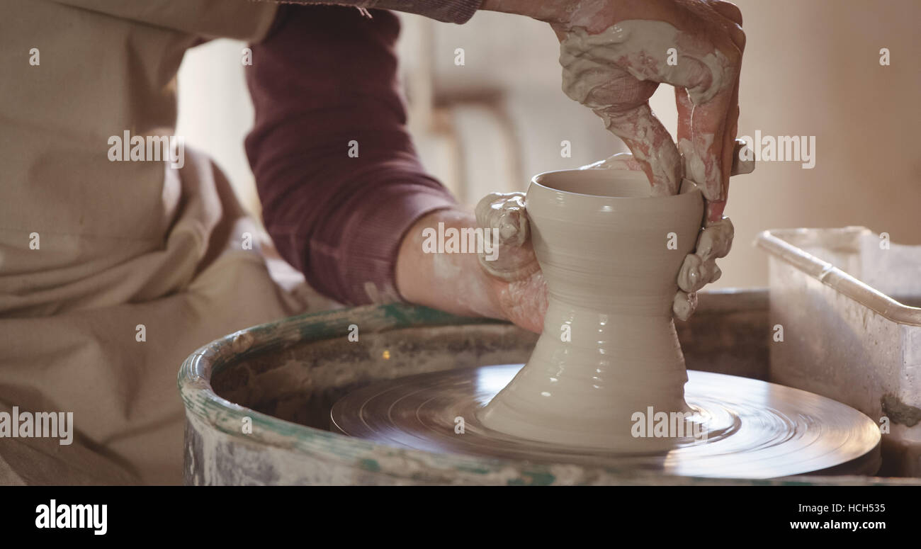 Male potter making pot Stock Photo Alamy