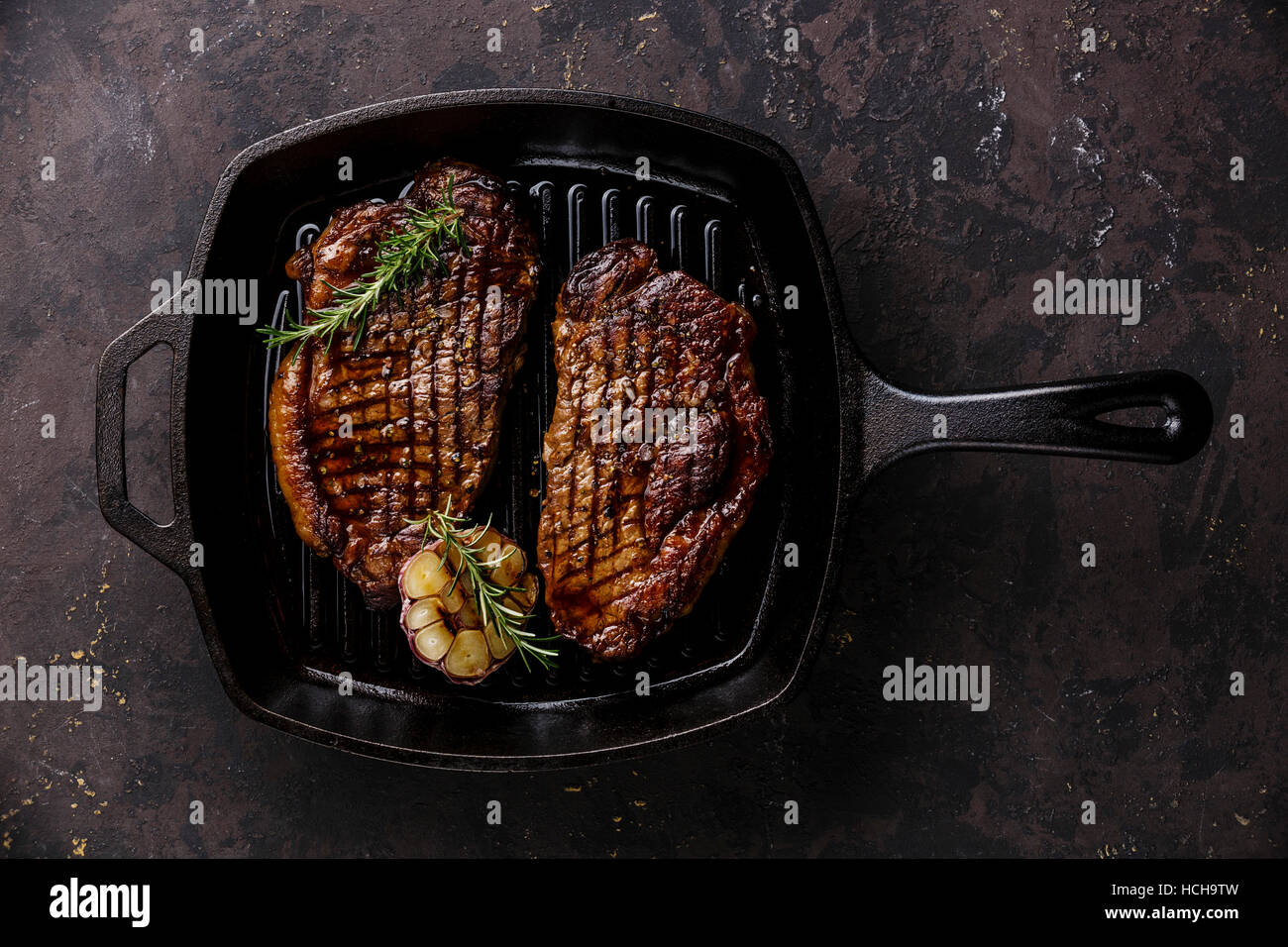 Grilled Black Angus Steak Striploin on frying cast iron Grill pan on