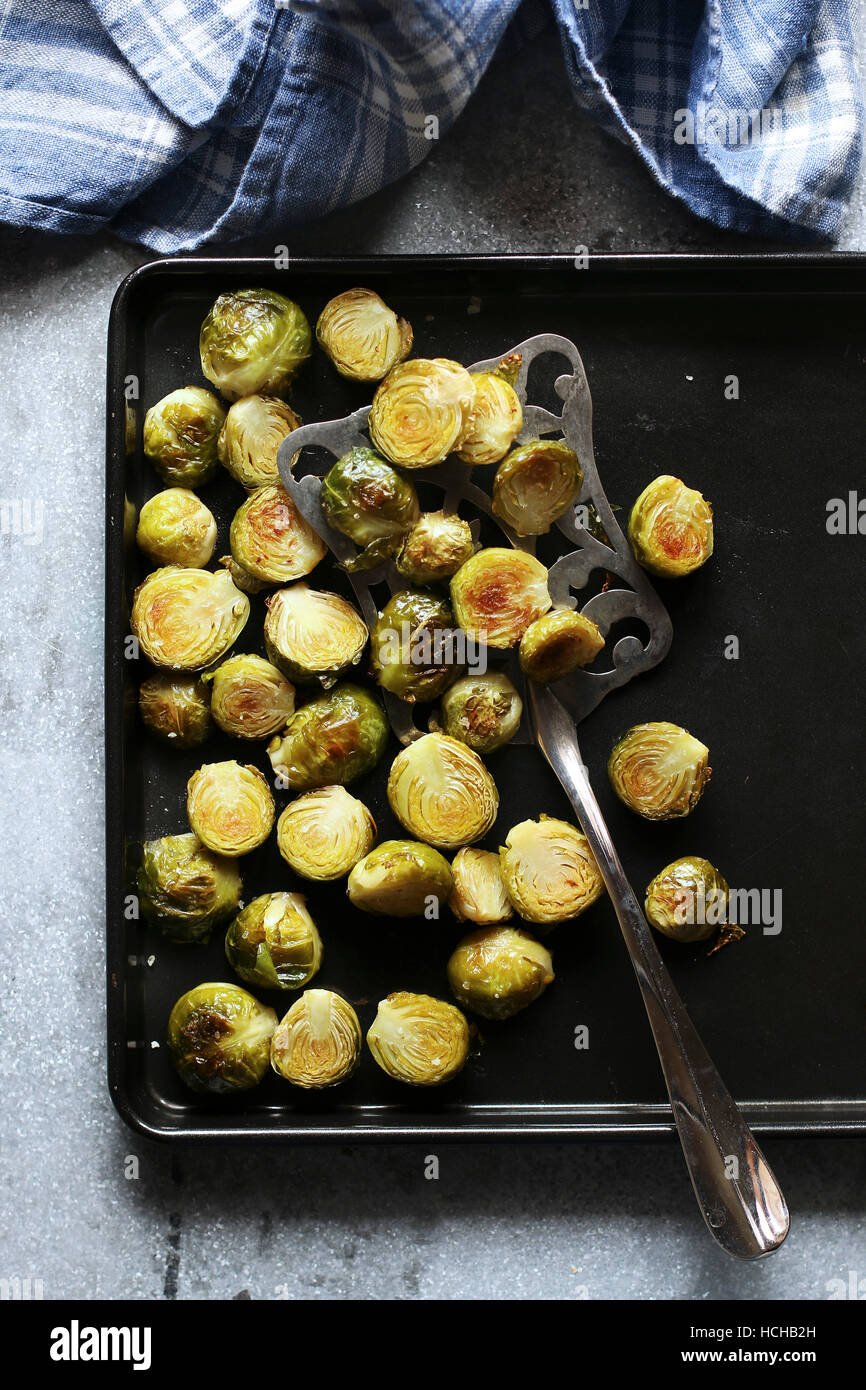 Roasted brussels sprouts on a pan.Top view Stock Photo