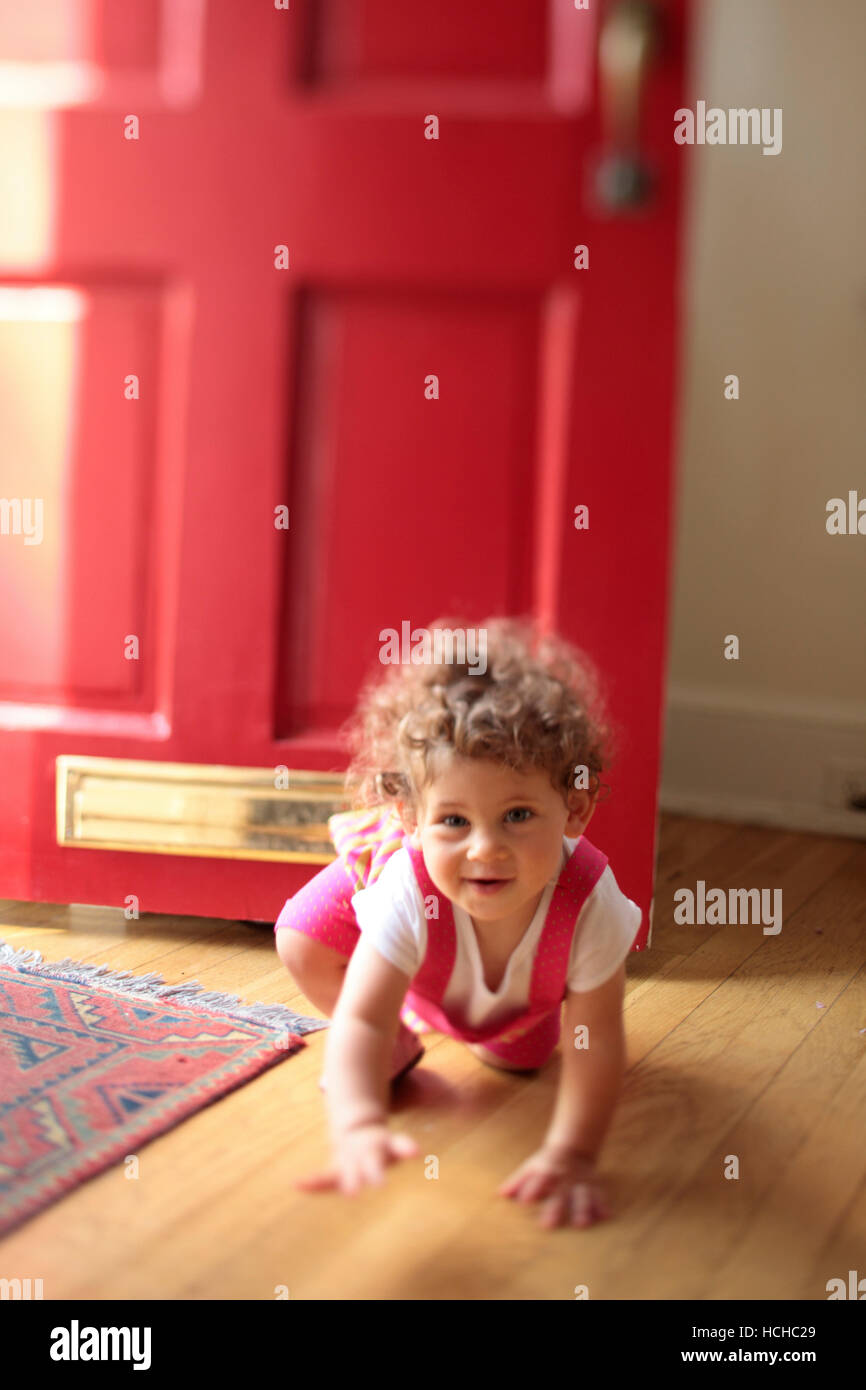 Girl, age 9 months, at home. Stock Photo