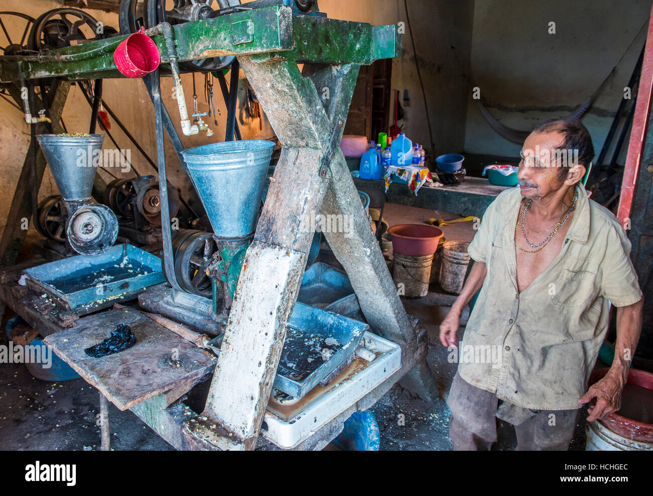Salvadoran man work at a Corn tortilla dough factory in Suchitoto El