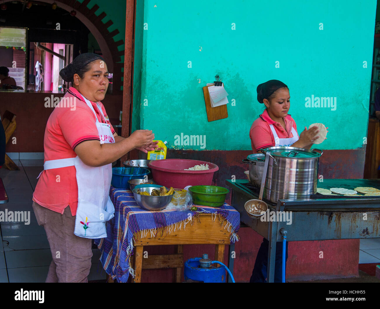Salvadoran women prepares Popusas in Suchitoto El Salvador. Popusa is a