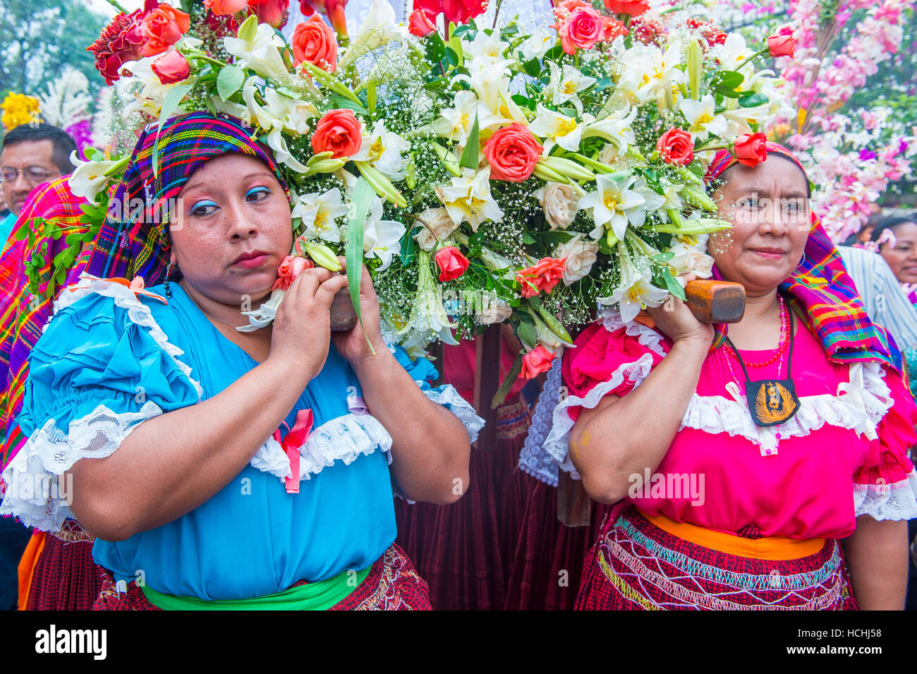 Salvadorian people participate in the procession of the Flower & Palm