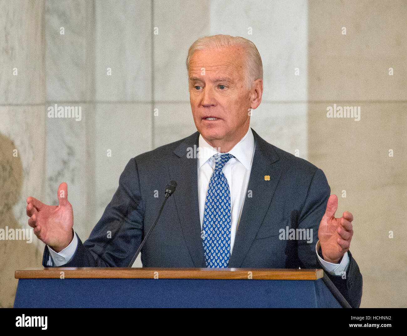 Washington DC, USA. 8th Dec, 2016. United States Vice President Joe Biden makes remarks at the ceremony where the official portrait of US Senate Minority Leader Harry Reid (Democrat of Nevada) is to be unveiled in the Kennedy Caucus Room on Capitol Hill in Washington, DC on Thursday, December 8, 2016. Credit:  MediaPunch Inc/Alamy Live News Stock Photo