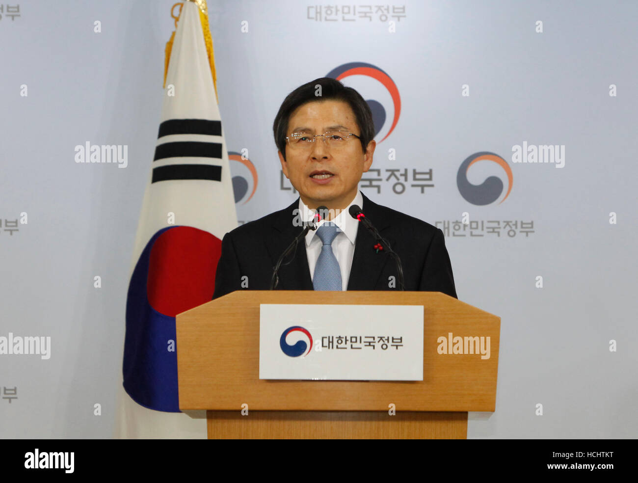 Seoul, South Korea. 9th Dec, 2016. South Korean Prime Minister Hwang Kyo-ahn gives a speech in Seoul, South Korea, Dec. 9, 2016. Impeached South Korean President Park Geun-hye said that she is gravely accepting the parliamentary decision to remove her from office after her impeachment motion was passed through the National Assembly with an overwhelming support. Prime Minister Hwang Kyo-ahn will take over, becoming acting president while the trial gets under way for as long as 180 days to determine whether to permanently force Park out. Credit:  Yao Qilin/Xinhua/Alamy Live News Stock Photo