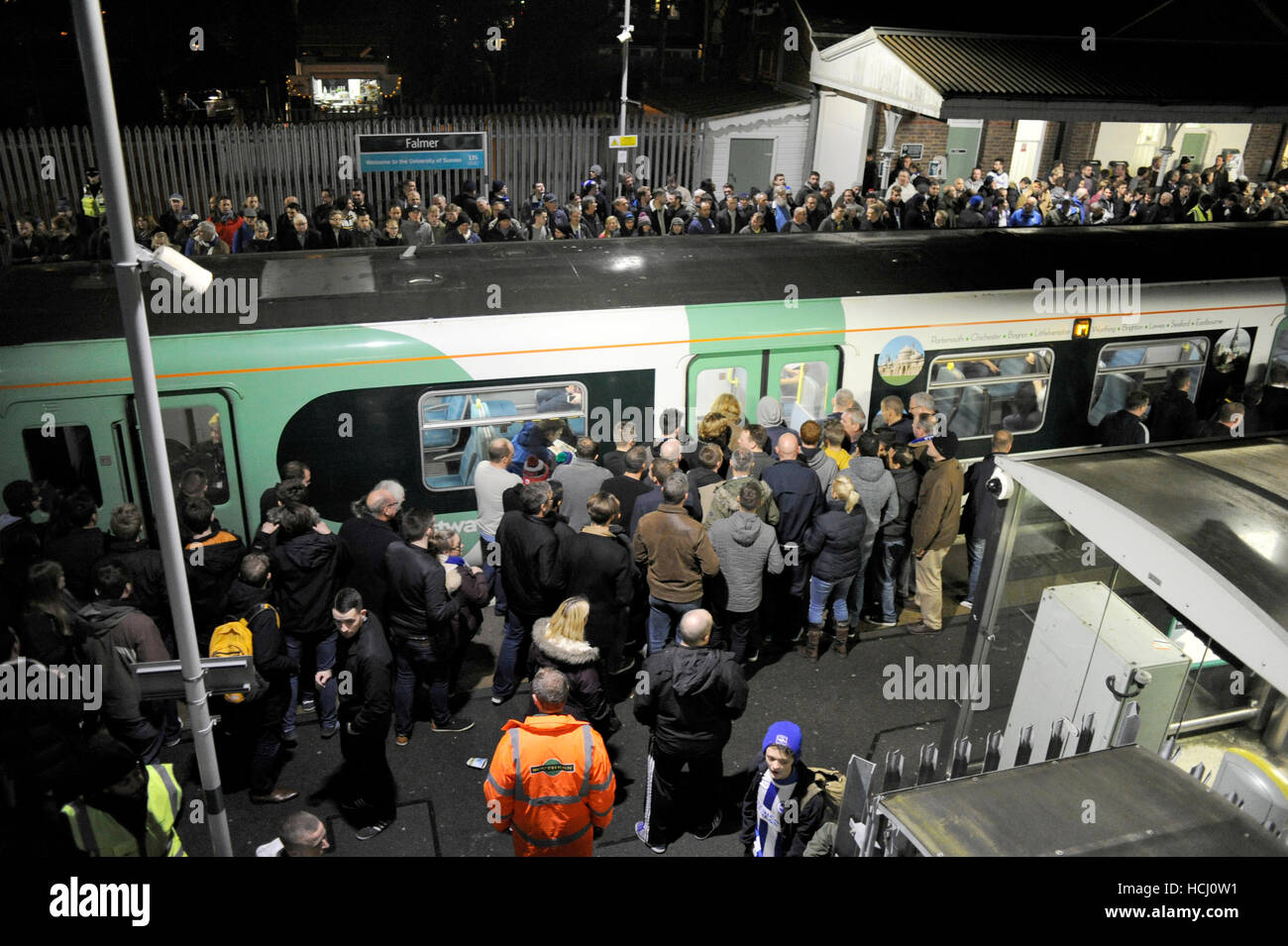 Brighton Sussex, UK. 9th Dec, 2016. Thousands of football fans try to get trains from Falmer Station after watching the match between Brighton and Hove Albion and Leeds United at the American Express Community Stadium this evening . Disruption continues on Southern Rail as strikes and cancellations continue to cause problems for passengers Credit:  Simon Dack/Alamy Live News Stock Photo
