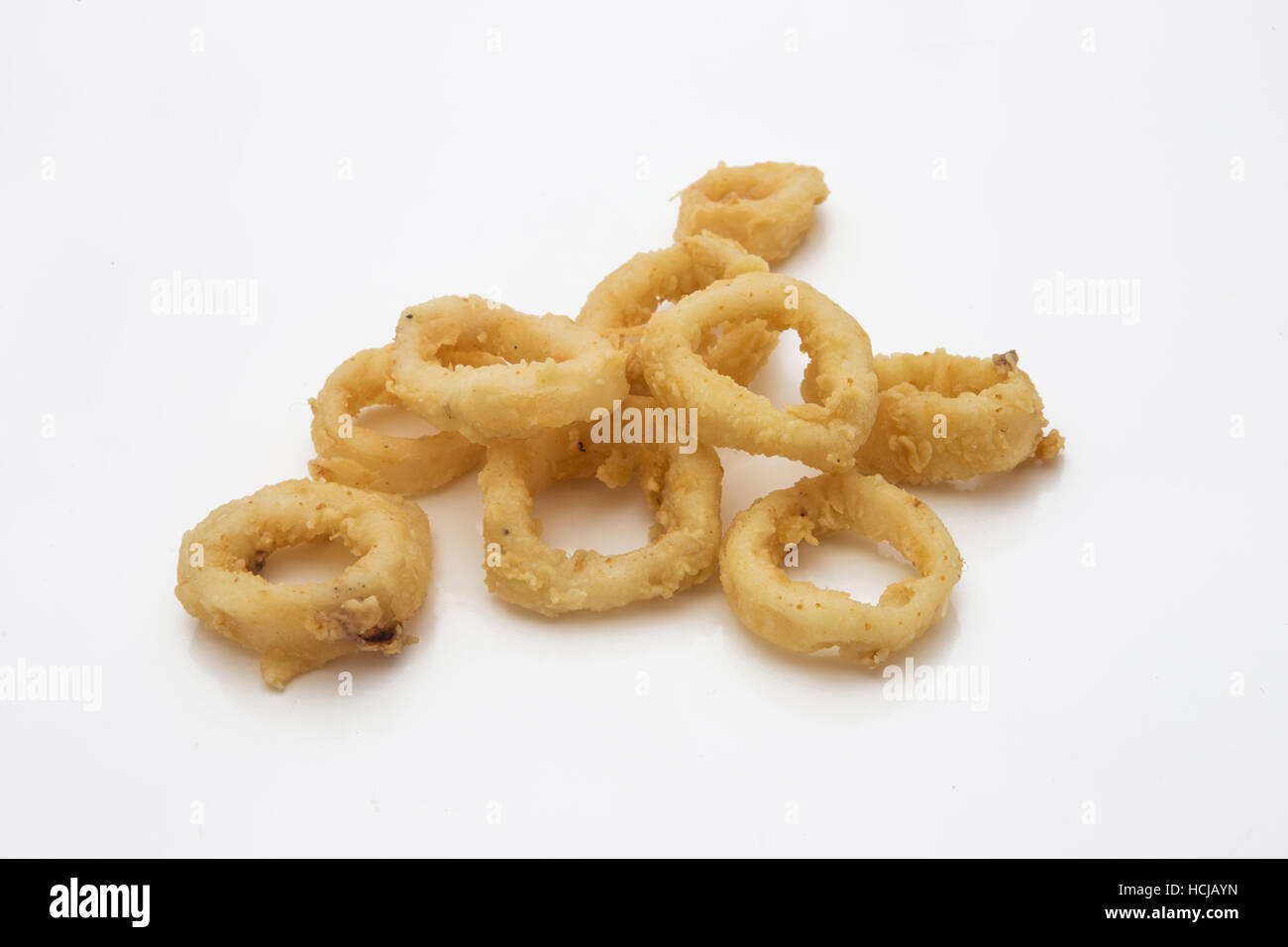 Calamari ring OR Fried squid ring with lemon and sauce - Italian food style isolated on white Stock Photo