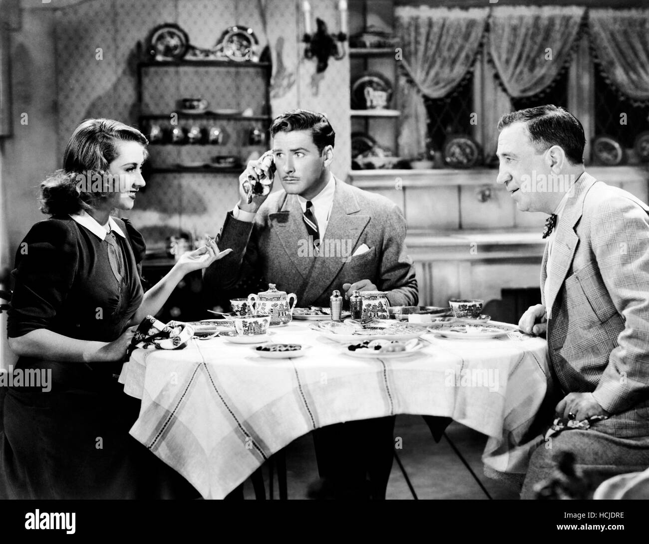 THE PERFECT SPECIMEN, from left: Joan Blondell, Errol Flynn, Hugh Herbert, 1937 Stock Photo