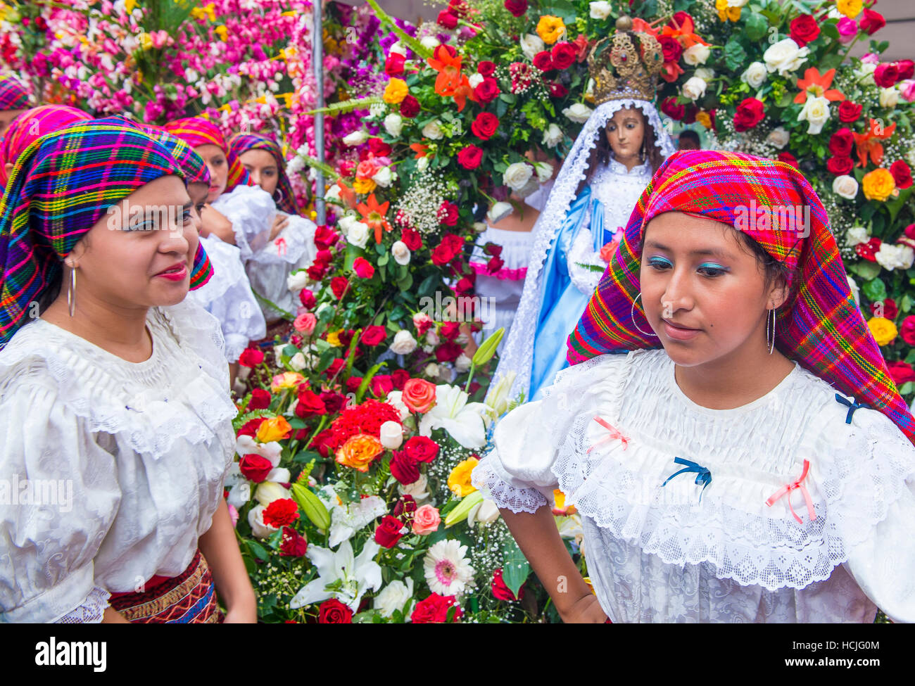 Salvadorian people participate in the procession of the Flower & Palm
