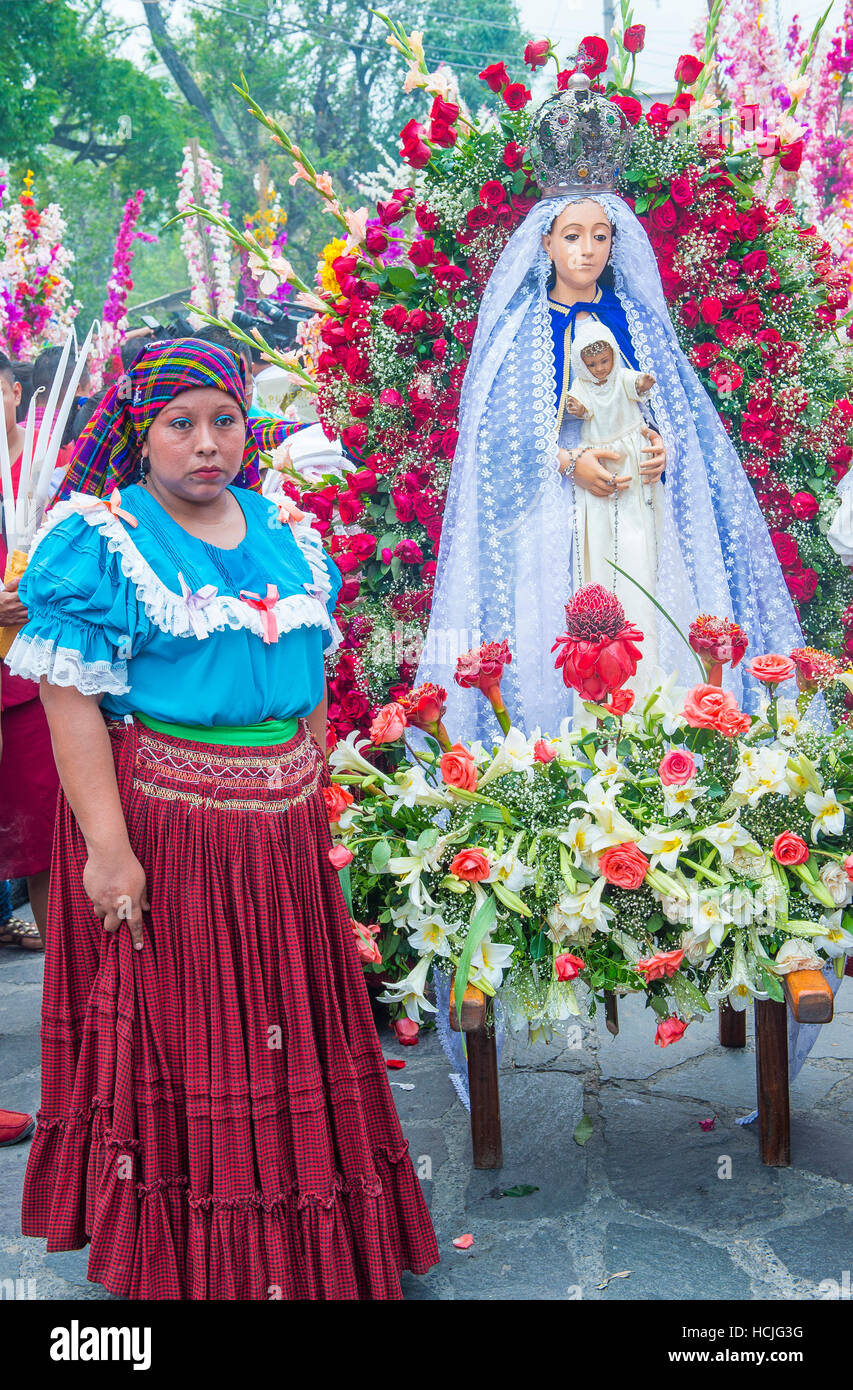 Salvadorian people participate in the procession of the Flower & Palm Festival in Panchimalco, El Salvador Stock Photo