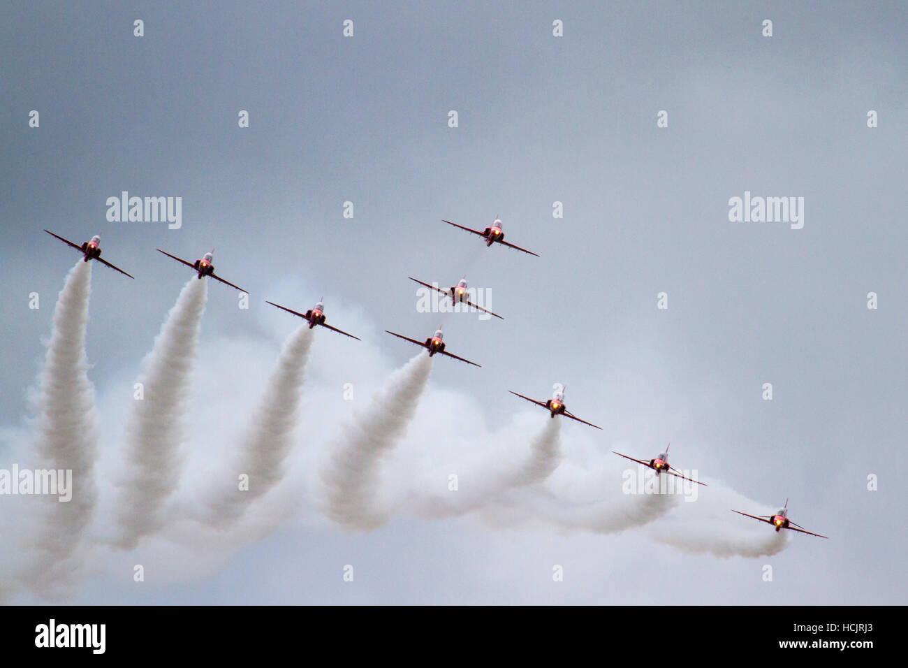 Red Arrows aviation display at Dunsfold Air Show in Surrey England in 2016 Stock Photo