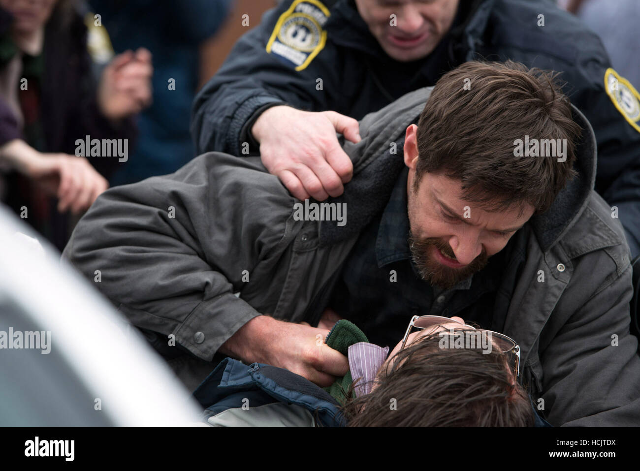 PRISONERS, Hugh Jackman (with beard), Paul Dano (bottom), 2013. ph Wilson b/©Warner Bros