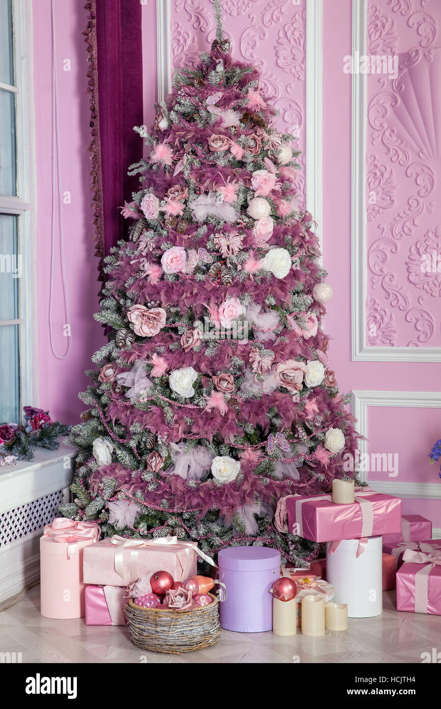 New Year tree decorated in pink toys Stock Photo - Alamy