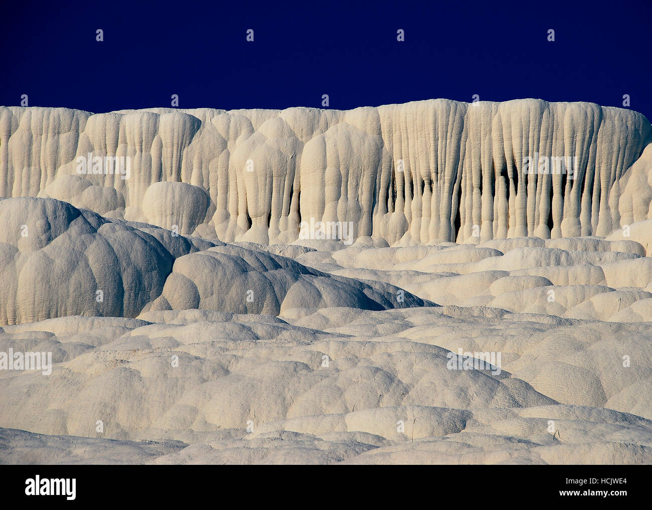Calcareous rock formation in Pamukkale, Turkey. Stock Photo
