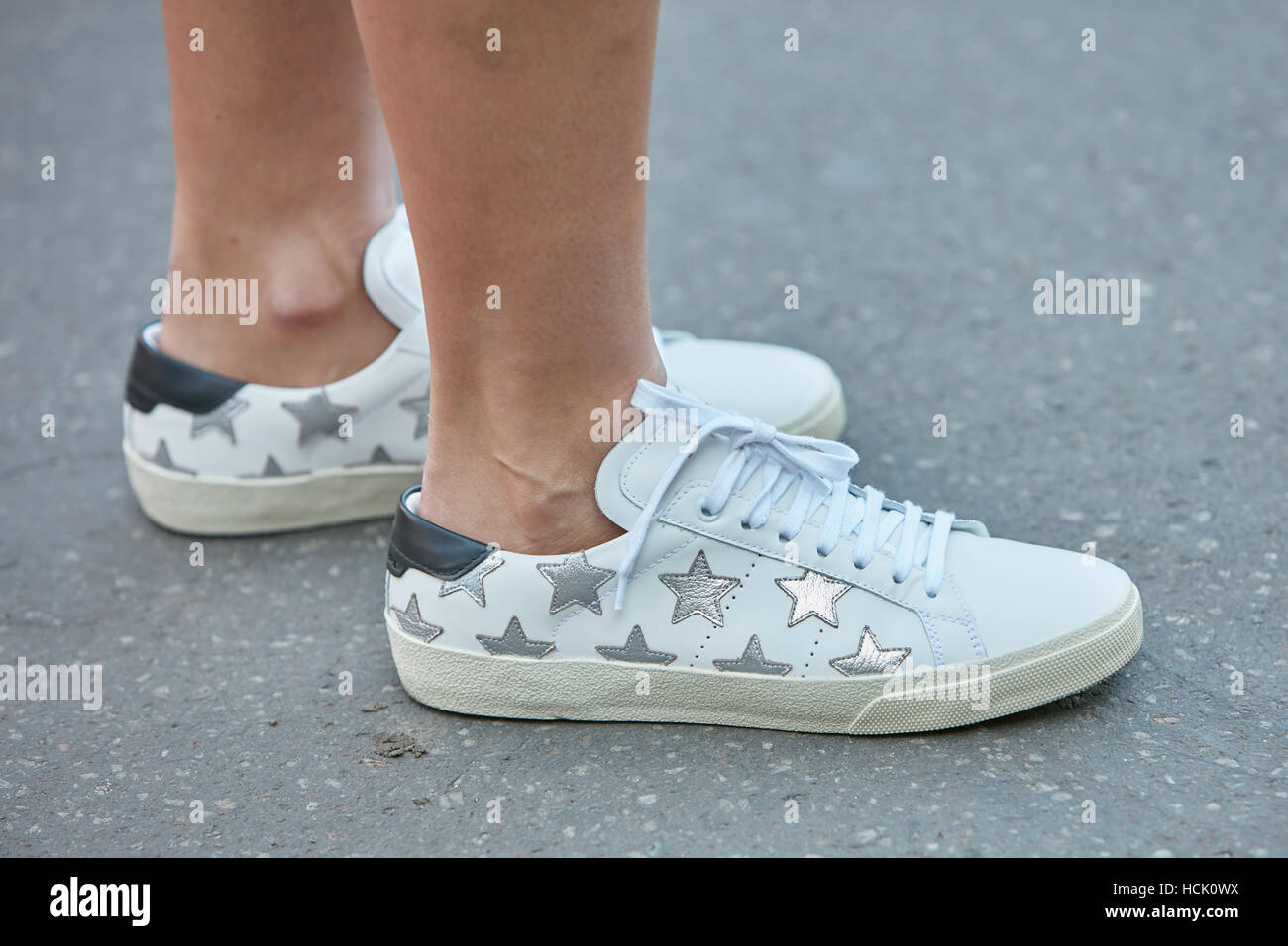 white sneakers with silver stars