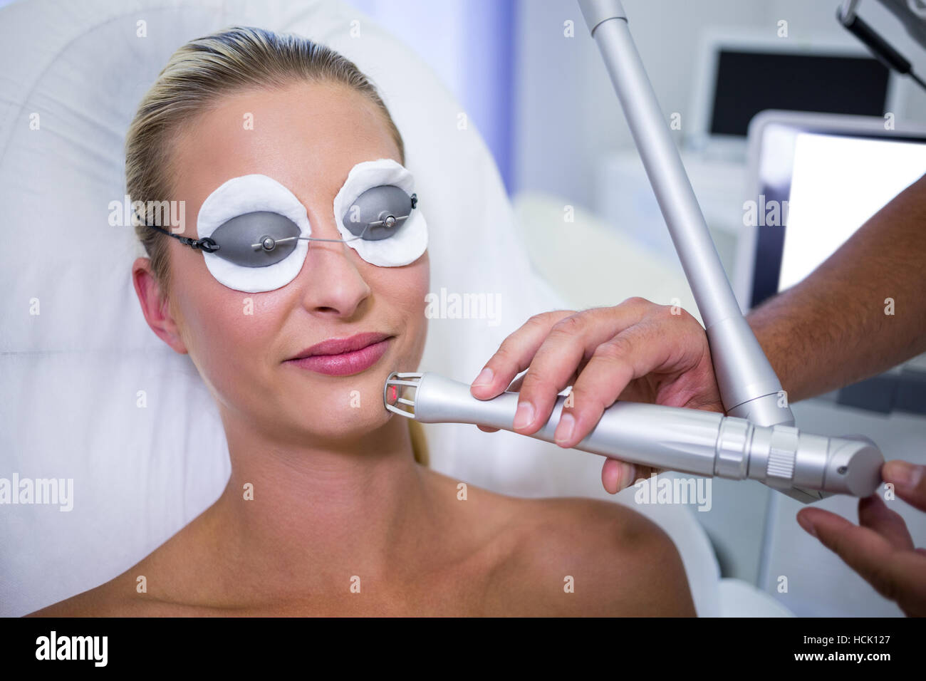 Female patient getting rf lifting procedure Stock Photo