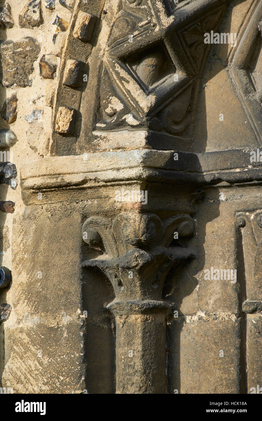 Castle Hedingham Church, Essex. Norman door on south side of the chancel, with zig-zag dogtooth decoration Stock Photo