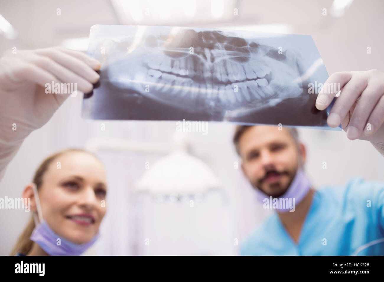 Dentists discussing over an x-ray Stock Photo