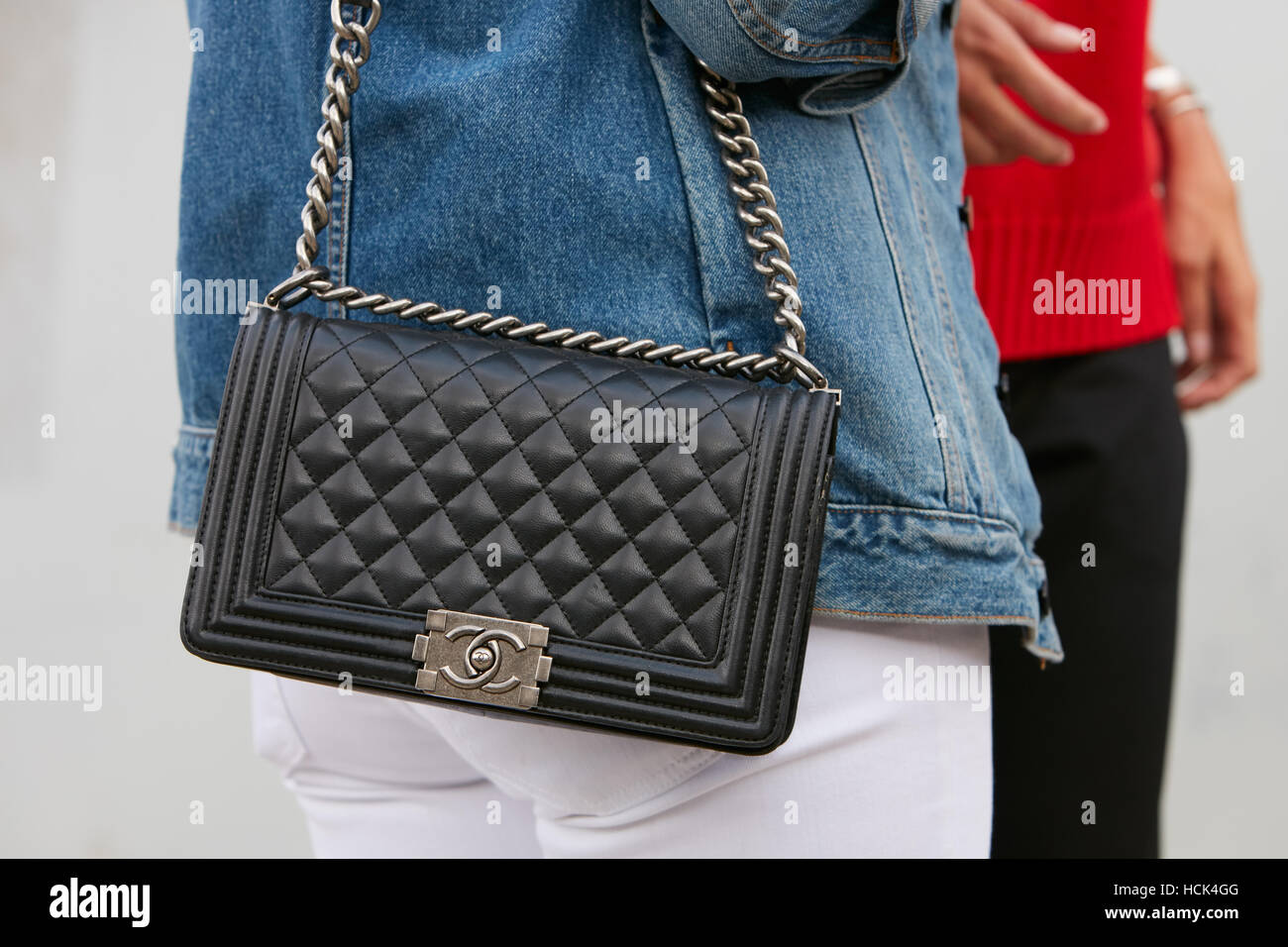 Woman with Big Black Leather Chanel Bag before Ermanno Scervino Fashion  Show, Milan Fashion Editorial Image - Image of illustrative, colorful:  194220720