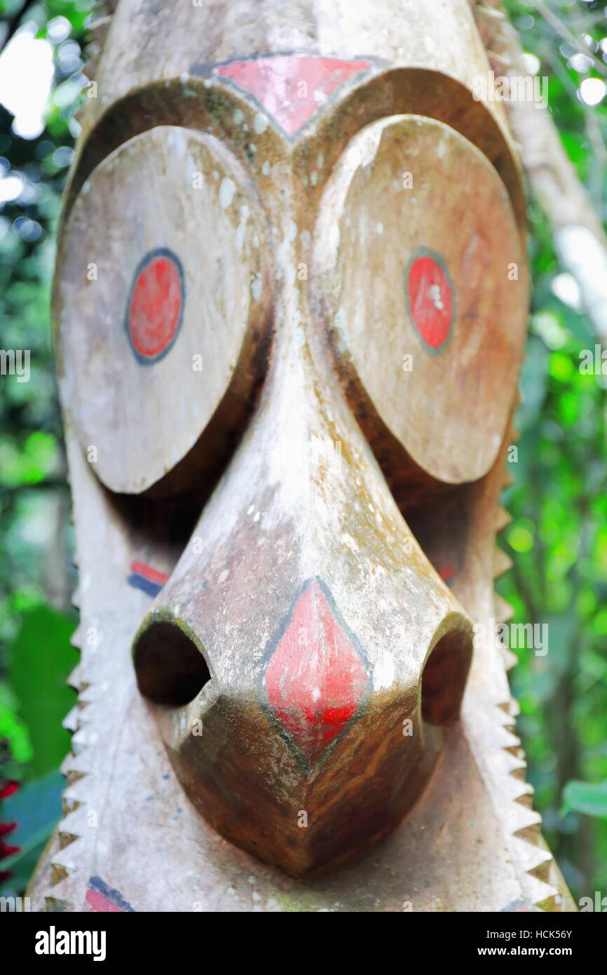 Wooden tam tam or split gong sculpted out of tree trunk representative of the local men.s mage society and proportional in number to their status. Ola Stock Photo