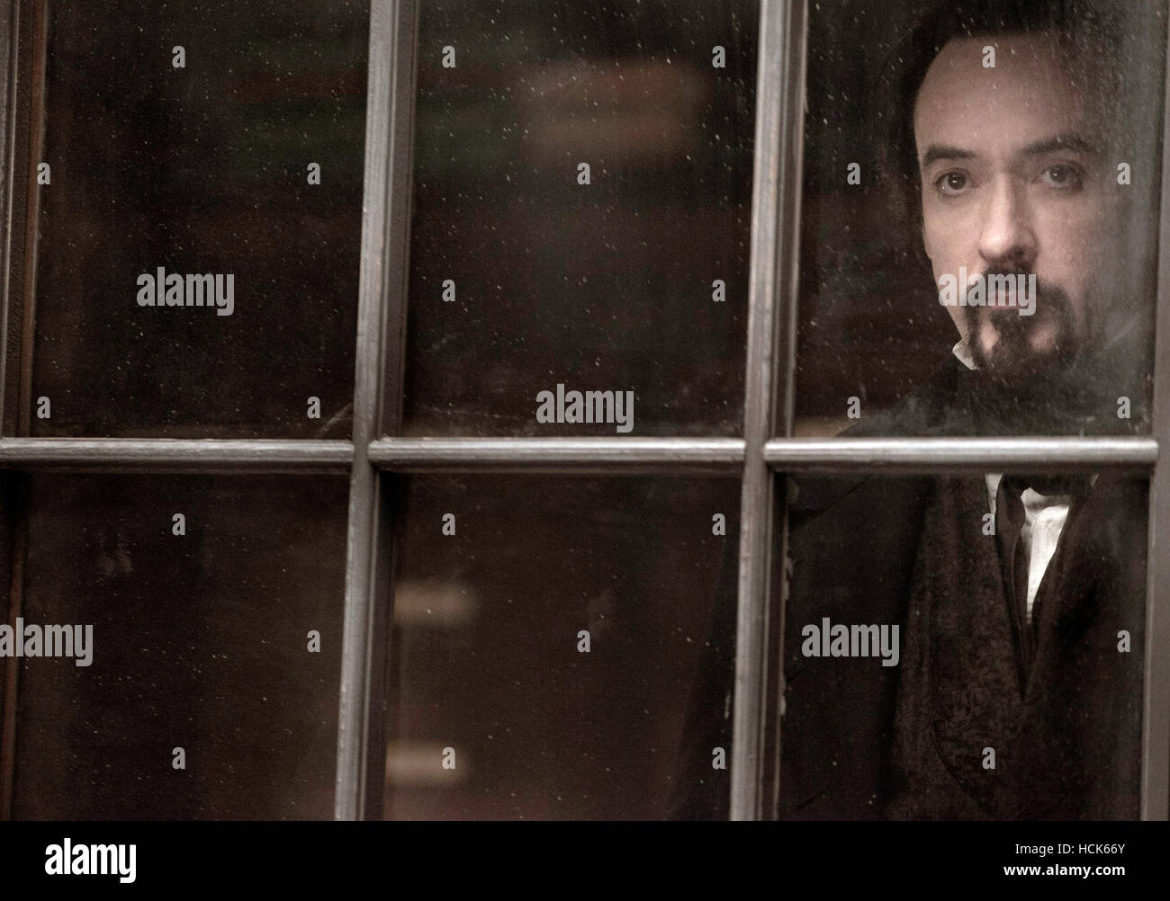 THE RAVEN, John Cusack, as Edgar Allan Poe, 2012. Ph Larry Horricks