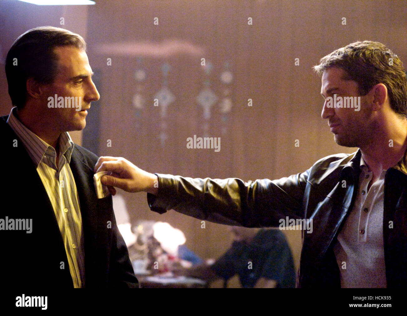 ROCKNROLLA, from left: Mark Strong, Gerard Butler, 2008. ©Warner Bros