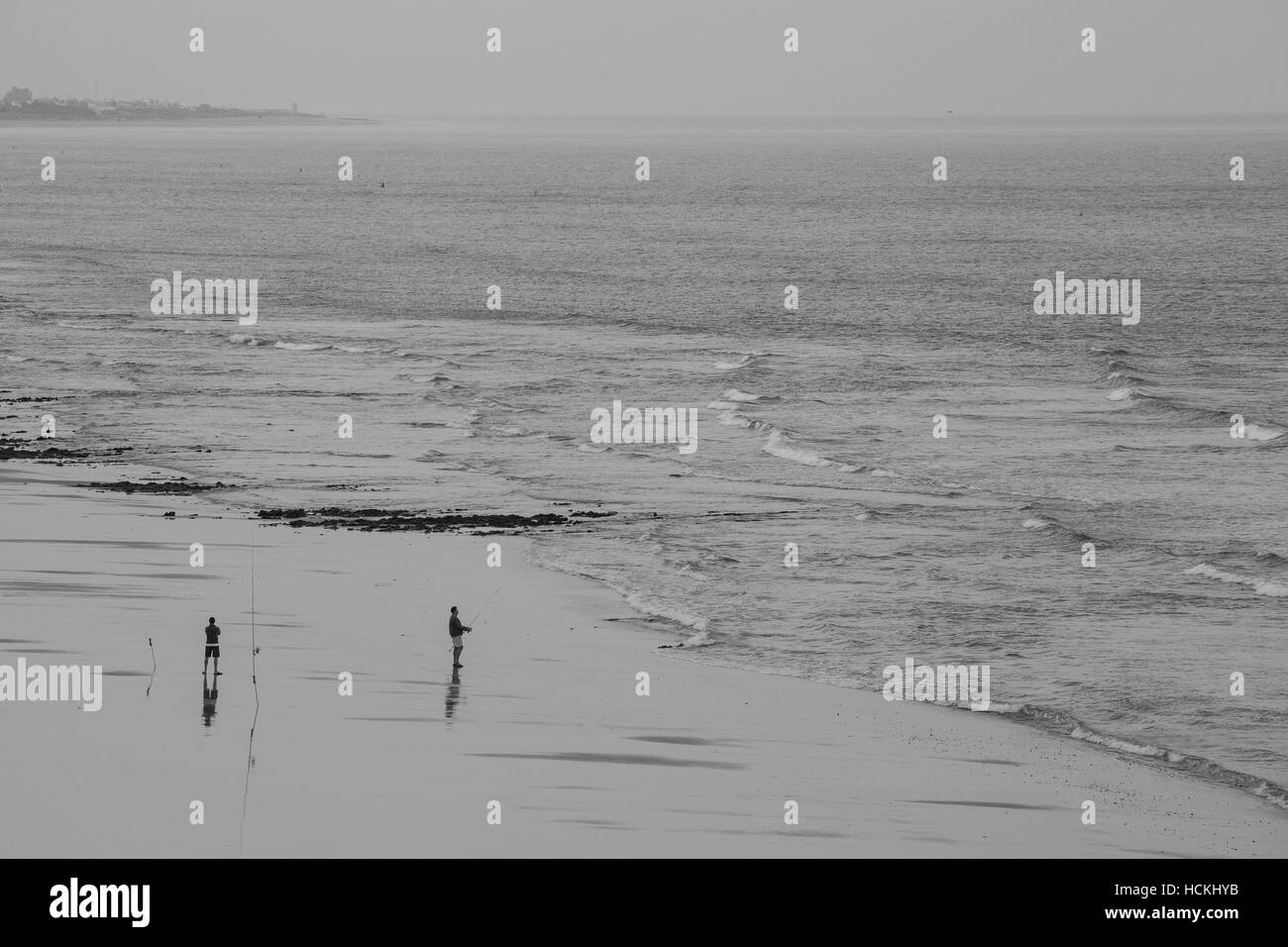 Two men fishing Black and White Stock Photos & Images - Alamy